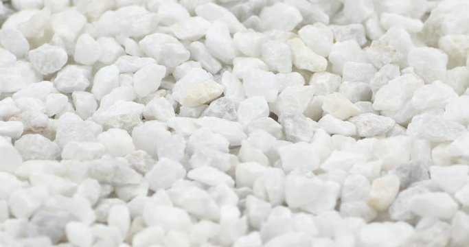 Close up white split stones on a rotating plate