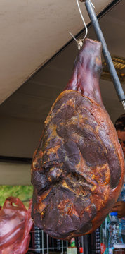 Sale of prosciutto meat cooked according to old recipes in rural areas of Montenegro.