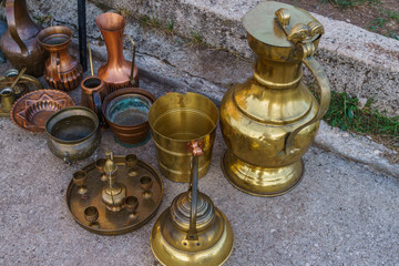 Obraz na płótnie Canvas copper and brass items, coffee pots, jugs and other retro items.September 2018. Montenegro