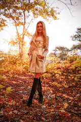 Beautiful blond woman and autumn time 