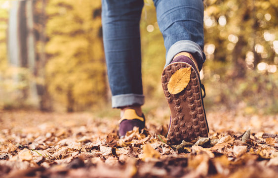 Autumn Concept, Close Up Of Shoe Sole With Yellow Leaf On It