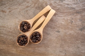 Roasted coffee beans in spoon