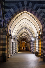 Arched street at night