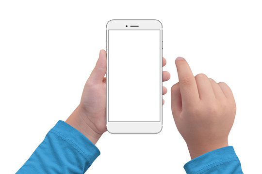 Little boy holding white modern smartphone with empty screen in hand, isolated on white background. Mockup