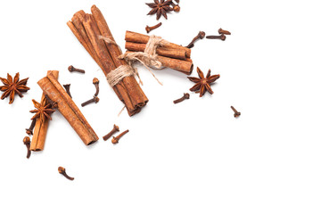 Cinnamon sticks and star anise isolated on white background
