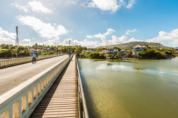 River scene with mountains in Mahebourg, Mauritius. Mauritius, an Indian Ocean island nation, is known for its beaches, lagoons and reefs.