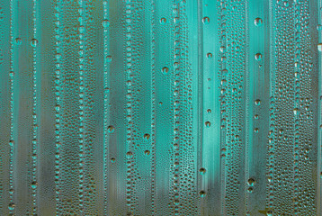 abstract background with big and small water drops in different colors - sea blue and green color