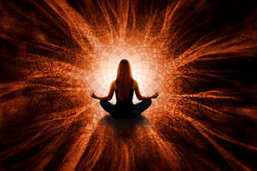 Woman in meditation with mandala