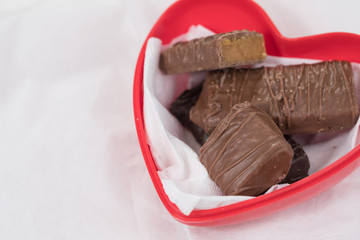 CHOCOLATE BARS WITH TOFFEE CARAMEL ON WHITE NAPKIN