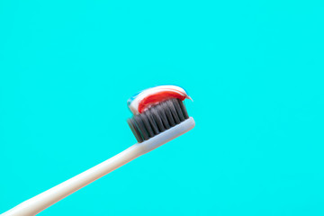 Flat lay composition with manual toothbrushes on color background, close up