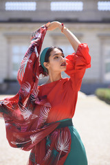 Fashion portrait of young spanish woman. Fashion latin look. Flamenco cloths
