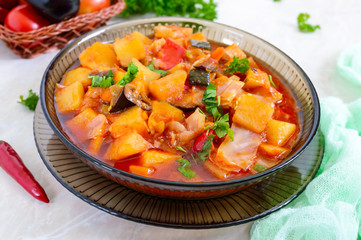 Delicious vegetable stew in a glass bowl. A popular dish of many countries of the world. Vegetarian menu