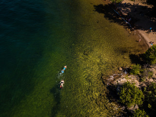 two people snorkeling