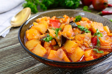 Delicious vegetable stew in a glass bowl. A popular dish of many countries of the world. Vegetarian menu