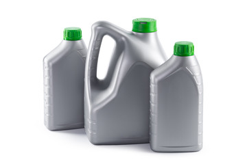Plastic bottles from automobile oils isolated on a white background