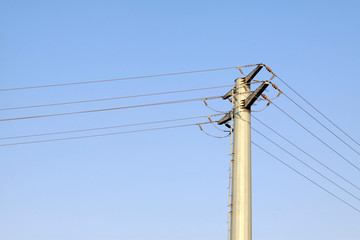 high voltage electric power steel tube tower under the blue sky