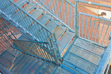 Metal security ladder for scaffolding used for the restoration of a building facade