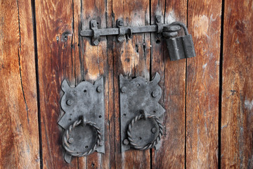 Old wooden doors. Door lock