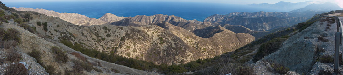View of eastern coastline from mountain road from Spoa to Olympos on Karpathos in Greece