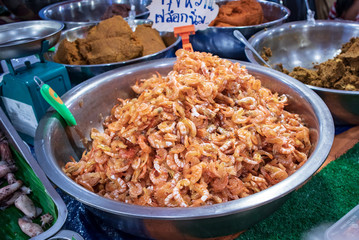 Fried crispy shrimp head snack.