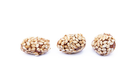 Coated peanuts with sesame isolated on white background