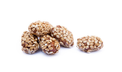 Coated peanuts with sesame isolated on white background