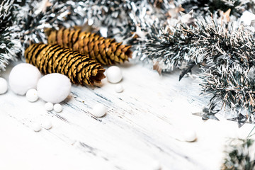 golden christmas tree decoration on wooden background