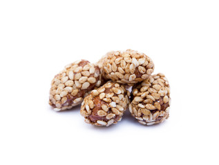 Coated peanuts with sesame isolated on white background