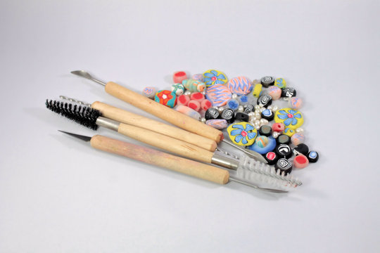 Polymer clay tools with handmade beads
