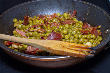 peanuts with spanish iberian ham and stick fork