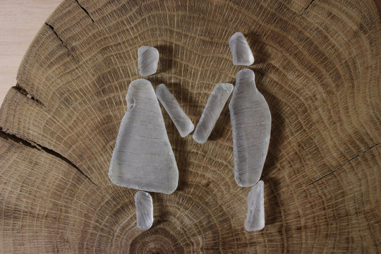 A couple (girl and boy) from white sea glass
