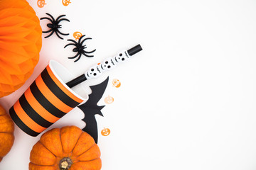 Halloween party background with pumpkins, spooky bats, creepy spiders