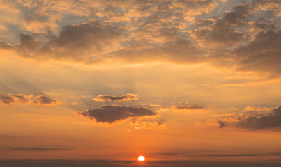 Fototapeta na wymiar Dramatic sky with cloud at sunset.