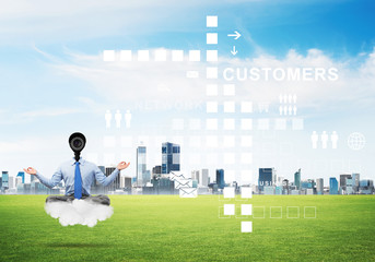 Camera headed man sitting in lotus pose on cloud against modern cityscape