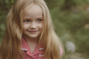Naklejka premium Choosing to be happy. Happy little child with adorable smile. Small child happy smiling. Little girl wear long hair. Small girl with blond hair. Confident in her hair