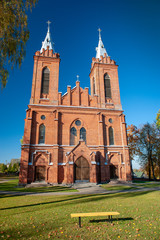 Fototapeta na wymiar St. George Catholic Church in Zasliai, Kedainiai, Lithuania. Built in 1445-1460, the Gothicchurch was the first brick building in Kedainiai, and isone of the oldest churches in Lithuania.
