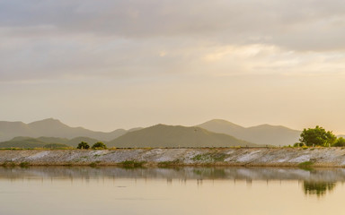 Landscape of the river and mountain with blue sky in the morning.