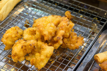 Traditional fried Tofu served with sweet chili sauce or sweet plum sauce. Famous Chinese vegetarian food cuisine.