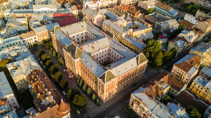 Chernivtsi city from above Western Ukraine. Regional Council building of Chernivtsi on sunset top view.