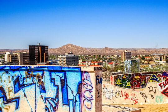 Windhoek downtown city center with walls painted graffity in the foreground, Namibia