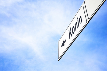 Signboard pointing towards Konin
