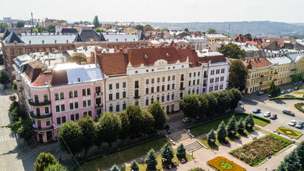 Top view of Chernivtsi city from above Western Ukraine. Bukovinian medical University building and Theatre square of Chernivtsi on sunset view.