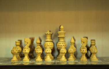 Wooden Chess pieces background.