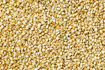 raw green buckwheat background, organic vegan food. Texture