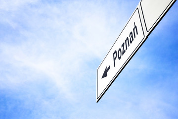 Signboard pointing towards Poznan