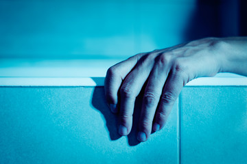 man on a bathtub in a creepy atmosphere