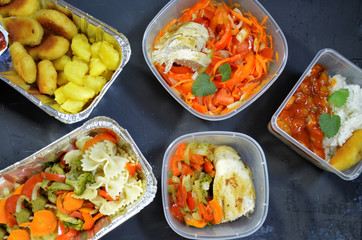 Healthy food and diet concept, restaurant dish delivery. Take away of fitness meal. Weight loss nutrition in foil boxes.