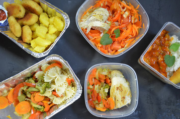 Healthy food and diet concept, restaurant dish delivery. Take away of fitness meal. Weight loss nutrition in foil boxes.