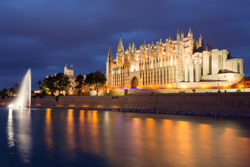 La Seu Cathedral at dusk with reflection over lake, Palma de Mallorca, Balearic Islands, Spain