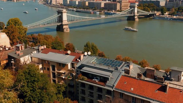 Wide angle shot of the Parliament and Chain Bridge in the Hungarian capital of Budapest named after the Scottish civil engineer